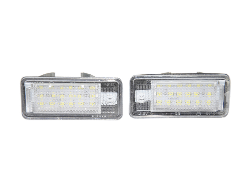 Фонарь подсветки номера LED комплект 2шт (Новые) Audi A6 C6 2004-2011 (АУДИ А6) (8E0807430A, 8E0943021B)